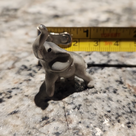 Tiny Porcelain Elephant - Picture 1 of 5